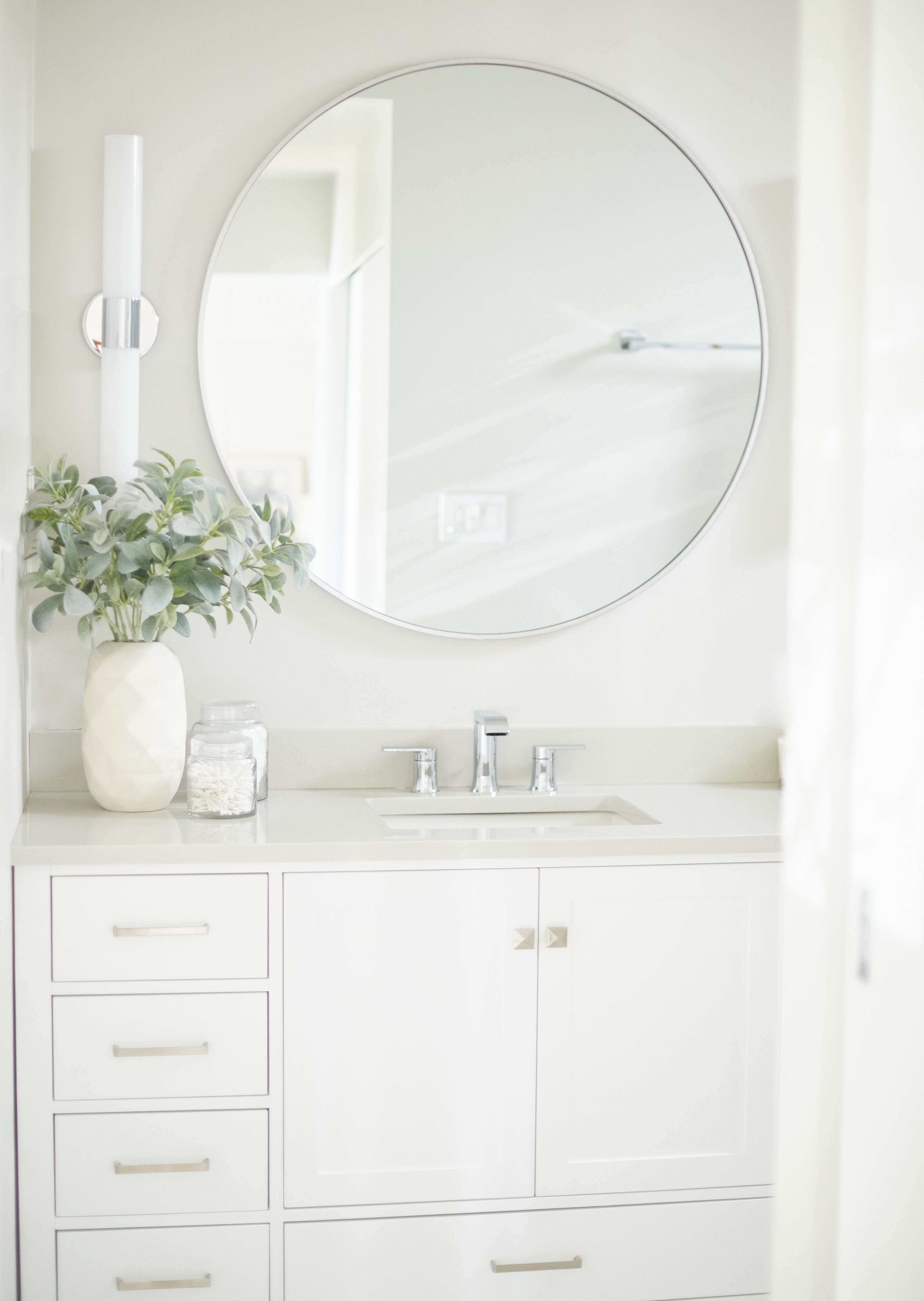 Clean white vanity wall
