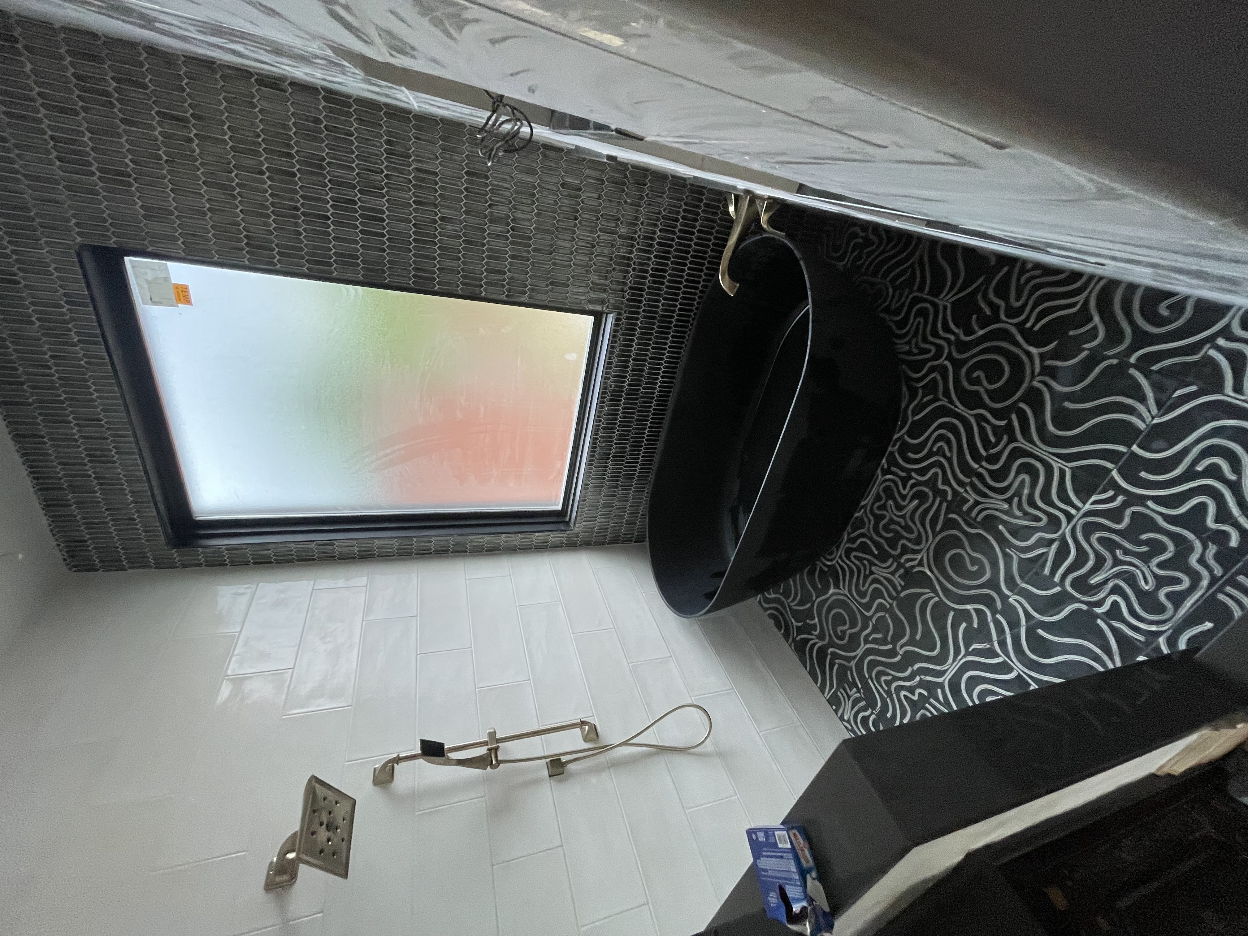 Black vessel + patterned floor