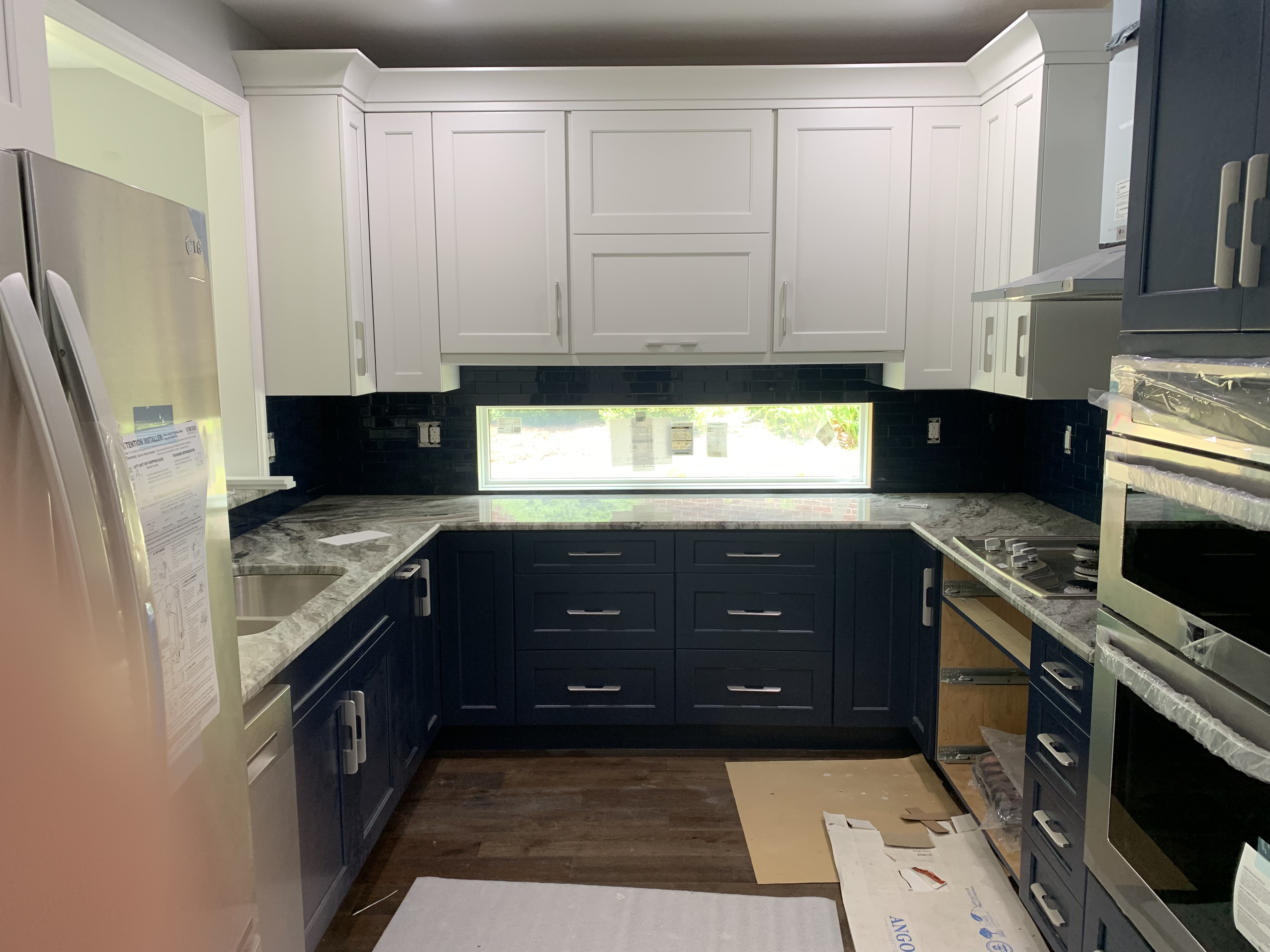 Navy kitchen, quartz tops